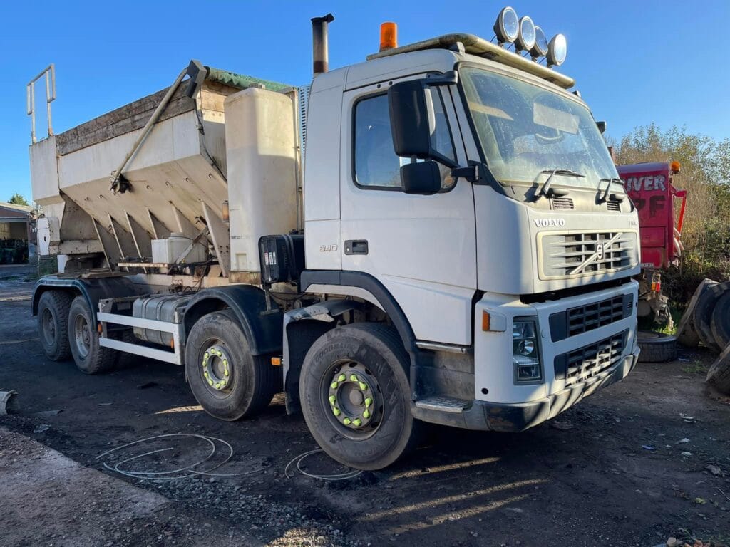 Volumetric concrete truck mixing concrete on site compared to drum truck delivery