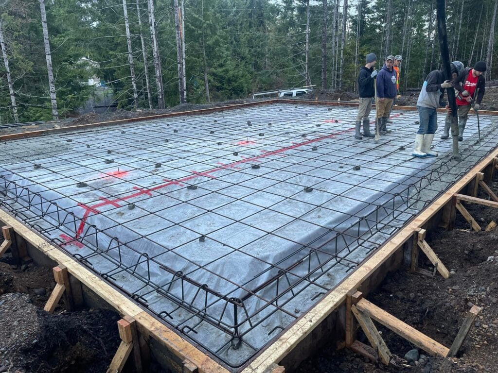 Prepare a job site for concrete pumping with proper rebar placement, formwork, and slab foundation setup