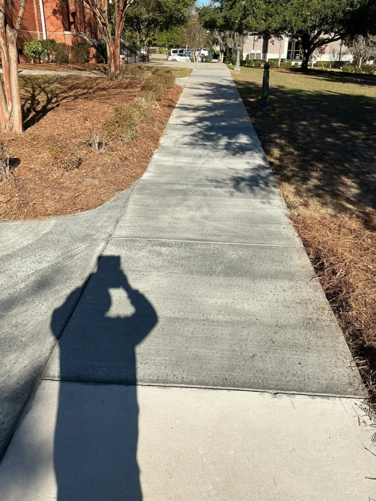 Concrete sidewalk in Calgary with broom finish, proper joints, and smooth pedestrian access