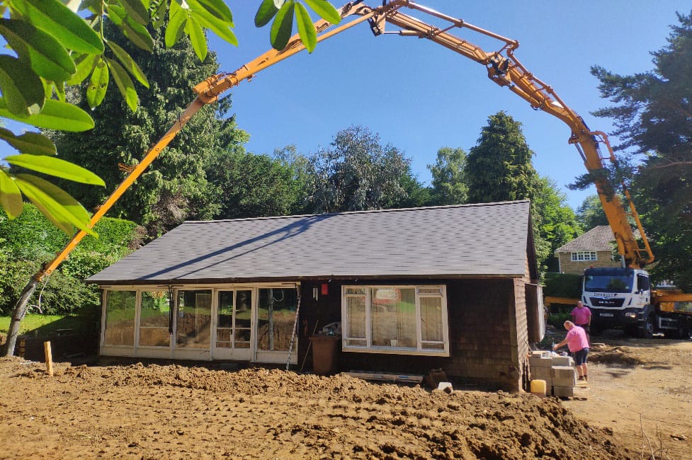 boom pump concrete pumping for tight spaces in Calgary urban site
